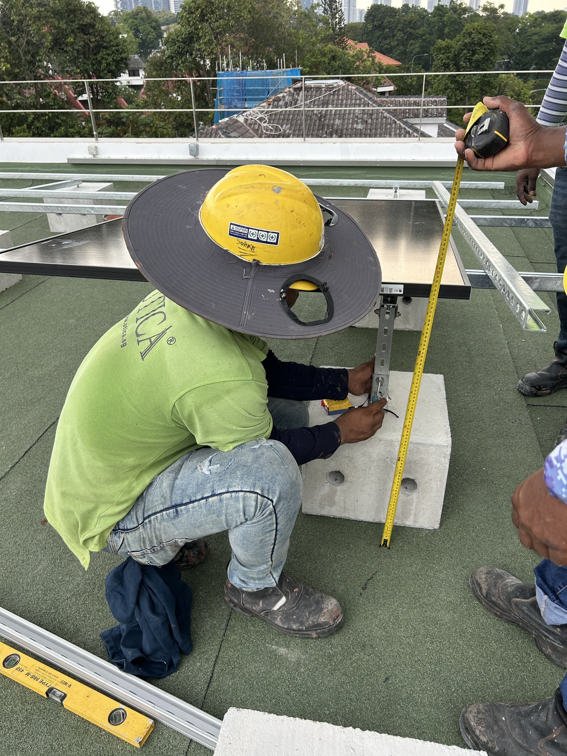 UTICA installation team coordinating a residential solar supporting structure