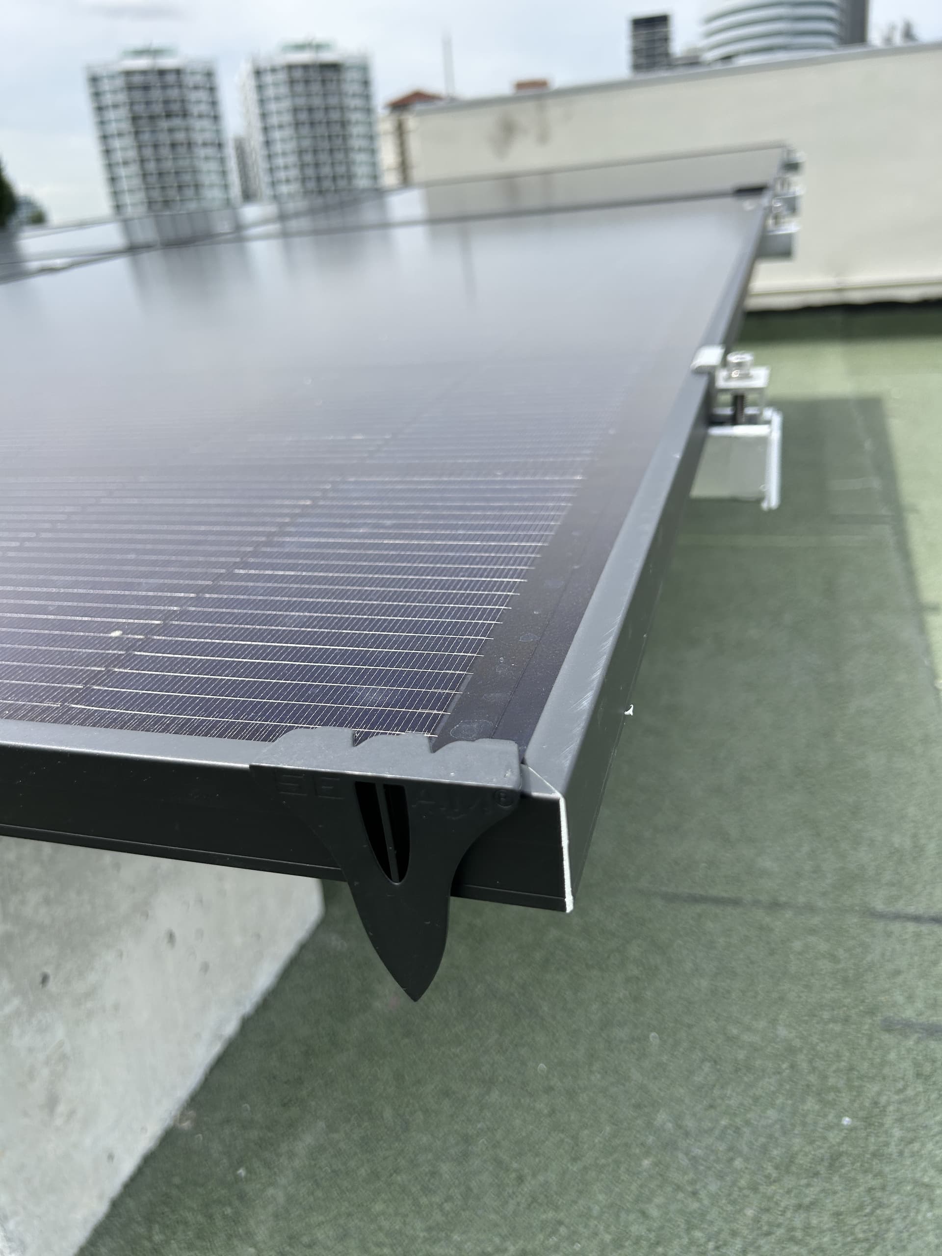 Finished solar panel edge, supporting structure and protection detail
